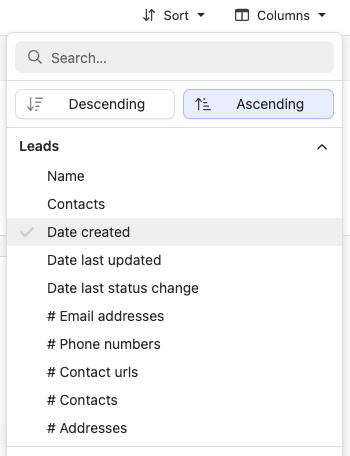Dropdown menu showing sort options and lead fields like Date created and Name.