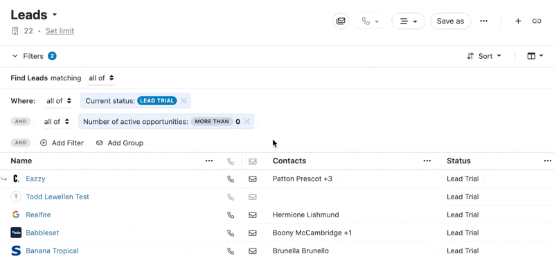 Leads list view showing active filters, lead names, contacts, and status with bulk action menu in the top-right.