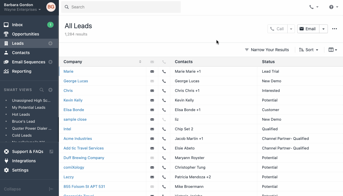 CRM All Leads table with sidebar smart views and search bar.