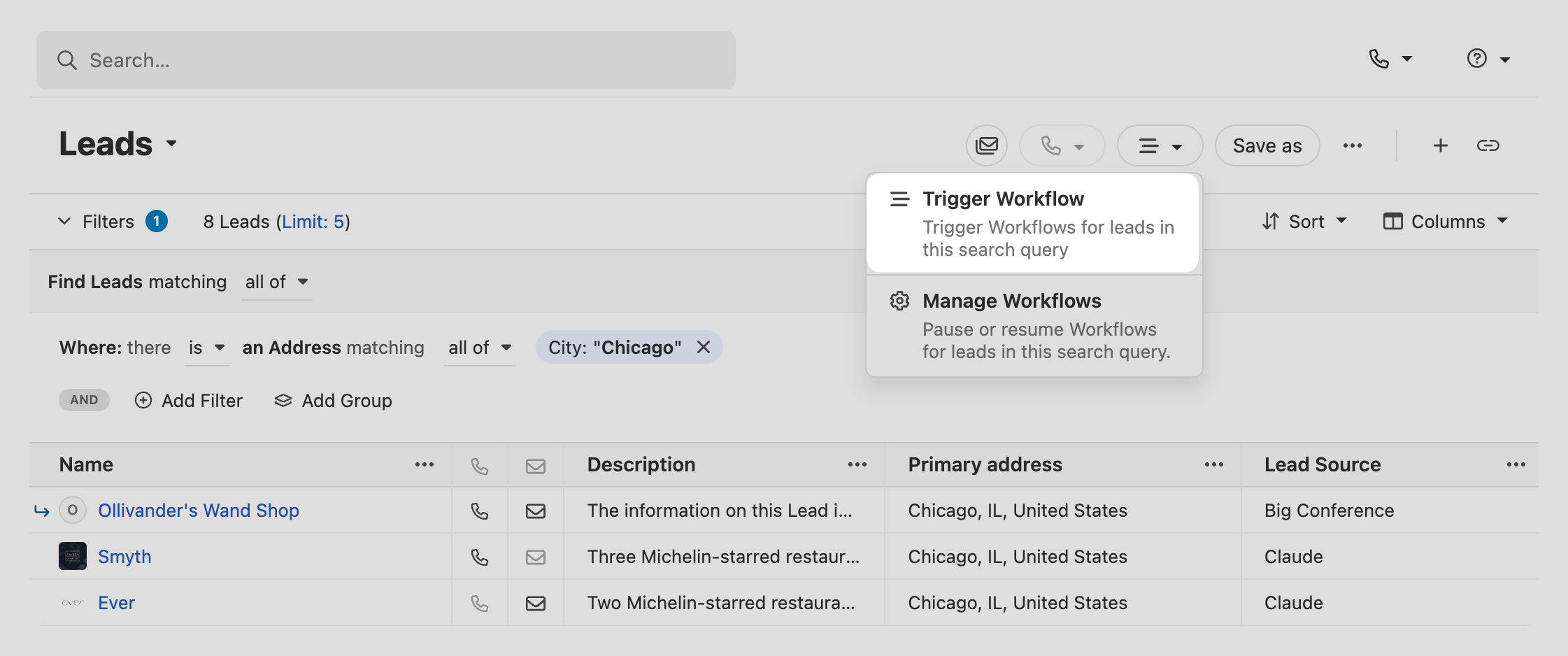 Leads list with a filter for Chicago and an open dropdown showing Trigger Workflow and Manage Workflows options.